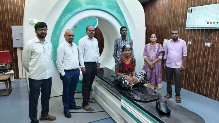 Milap team, hospital staff and a patient with the radiotherapy system installed at Ballari Medical College and Research Centre