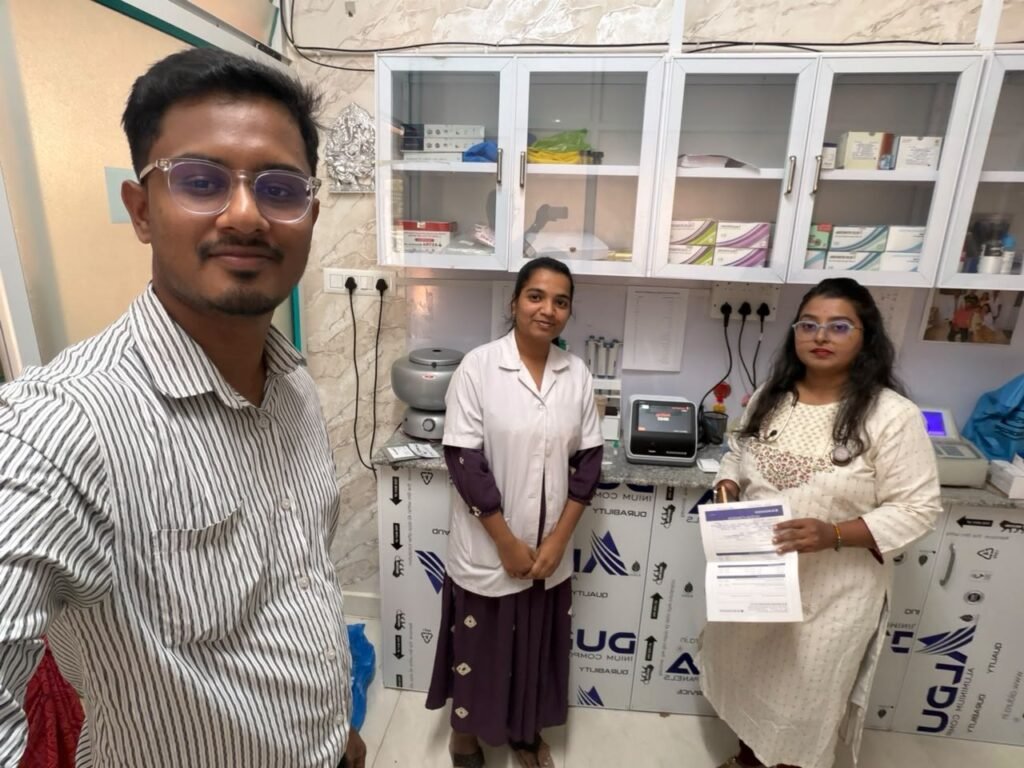 Milap engineer with the SD Biosensor STANDARD F200 FIA analyzer installed at Chirayu Healthcare