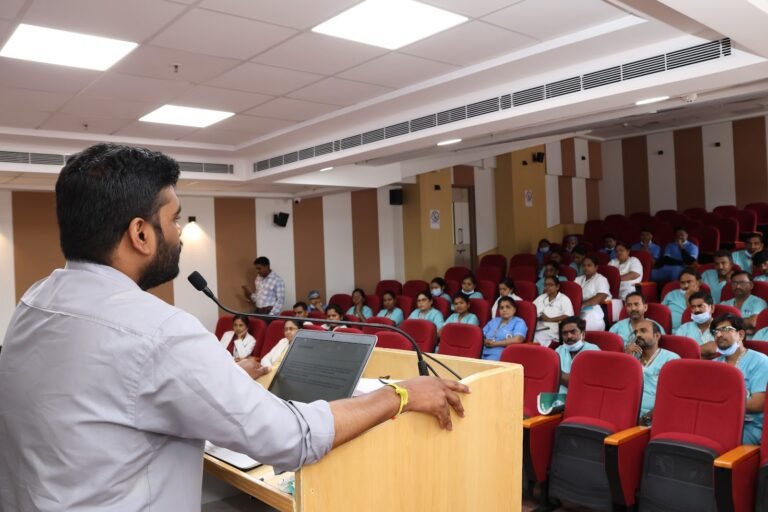 Milap specialist addressing nurses and lab staff at BLDE Hospital