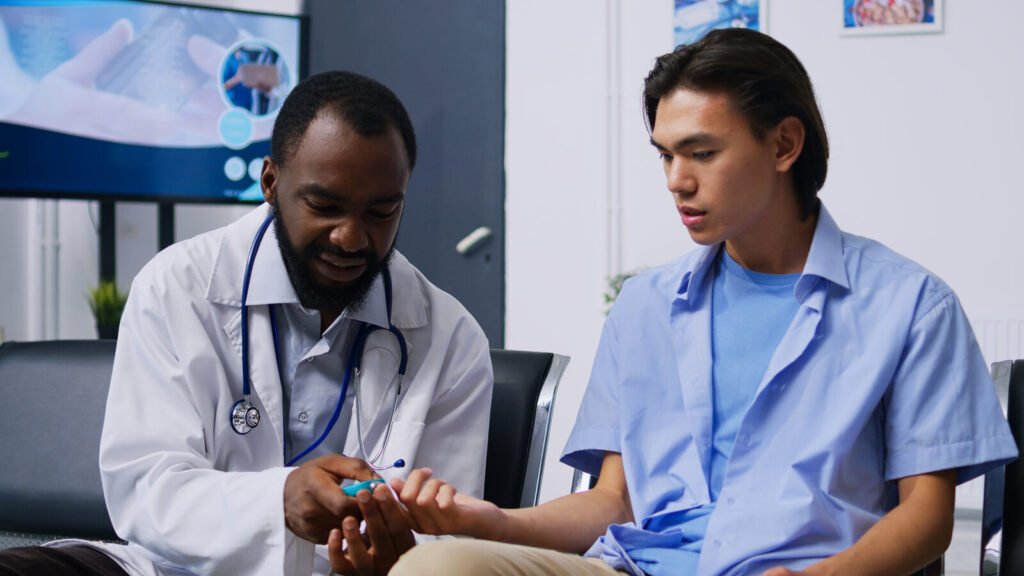 Doctor running a point-of-care blood test with a patient