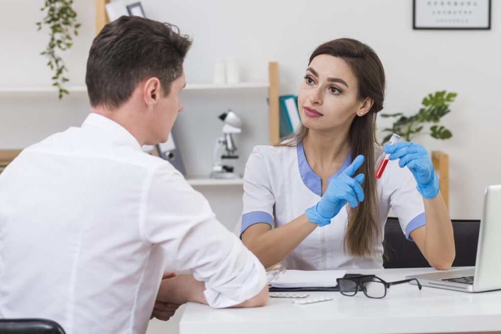 Doctor explaining a blood sample result to a patient