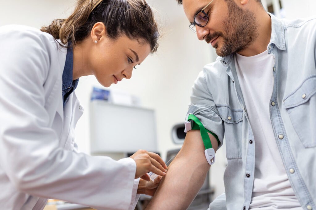 Phlebotomist collecting a blood sample for a complete blood count