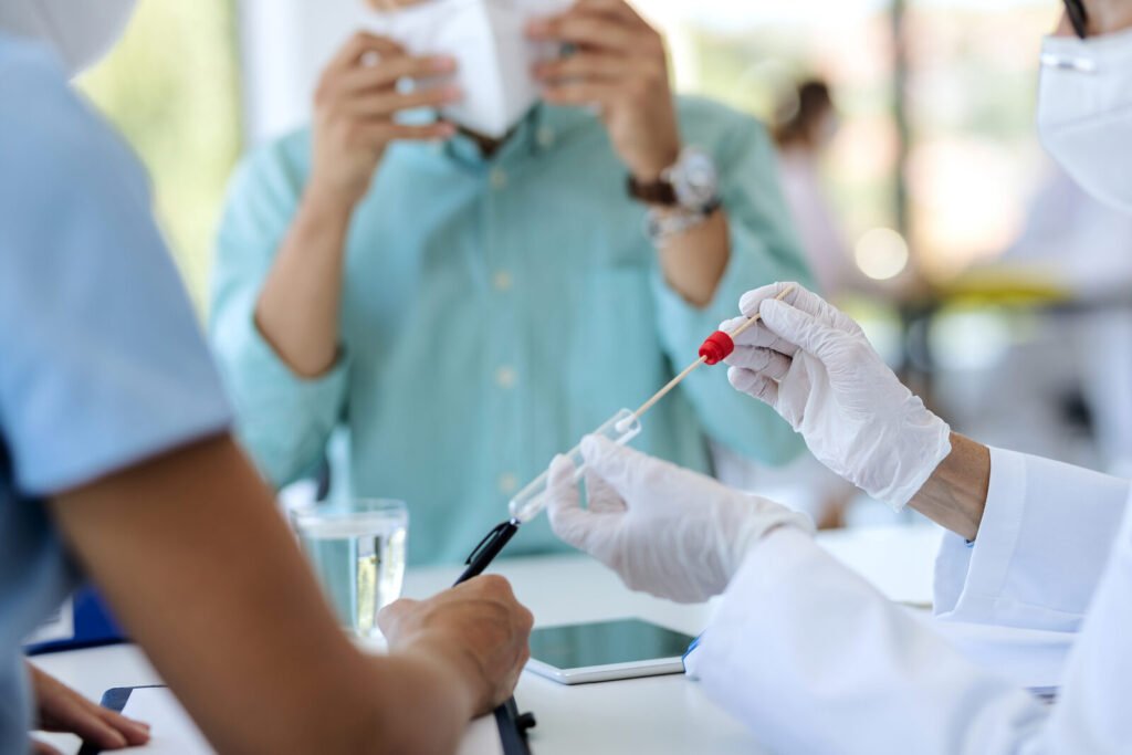 Healthcare worker testing a patient at a clinic