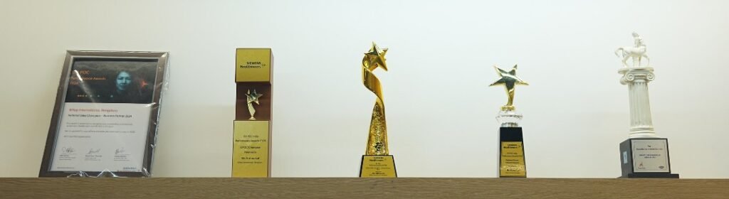 Awards and trophies on display at the Milap International head office