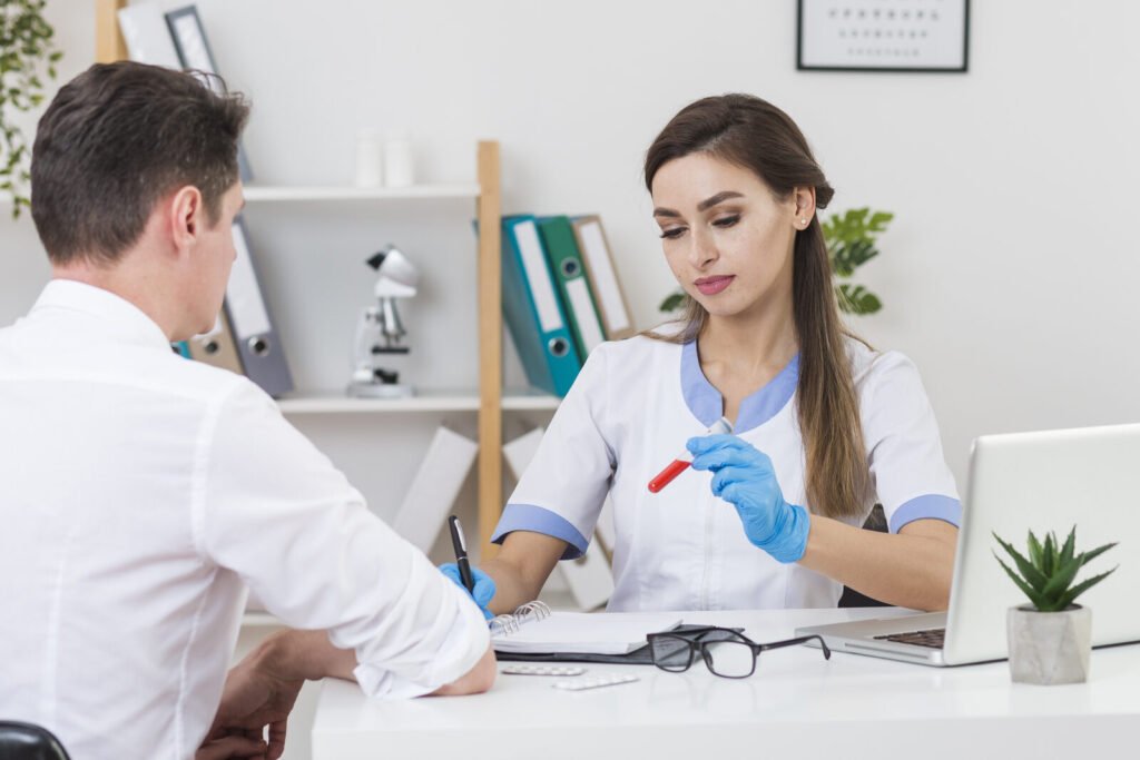 Doctor discussing a blood test with a patient in a clinic